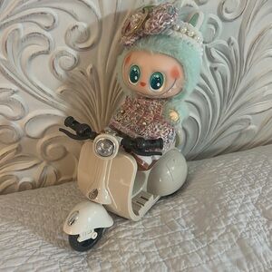 Cute Doll on Cream Scooter. Labubu NOT included.